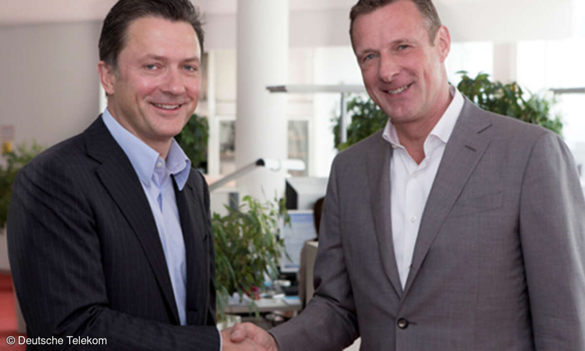 Udo Müller, Vorstandsvorsitzender Ströer und Niek Jan van Damme, Vorstandsmitglied Deutsche Telekom