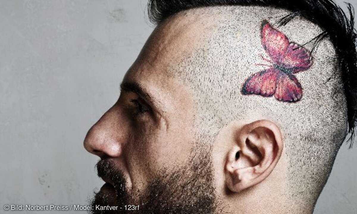 Mann Schmetterling Tätowierung