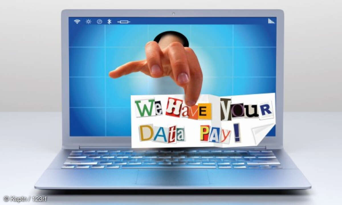 Hand aus einem Laptop, Drohbrief, Ransomware