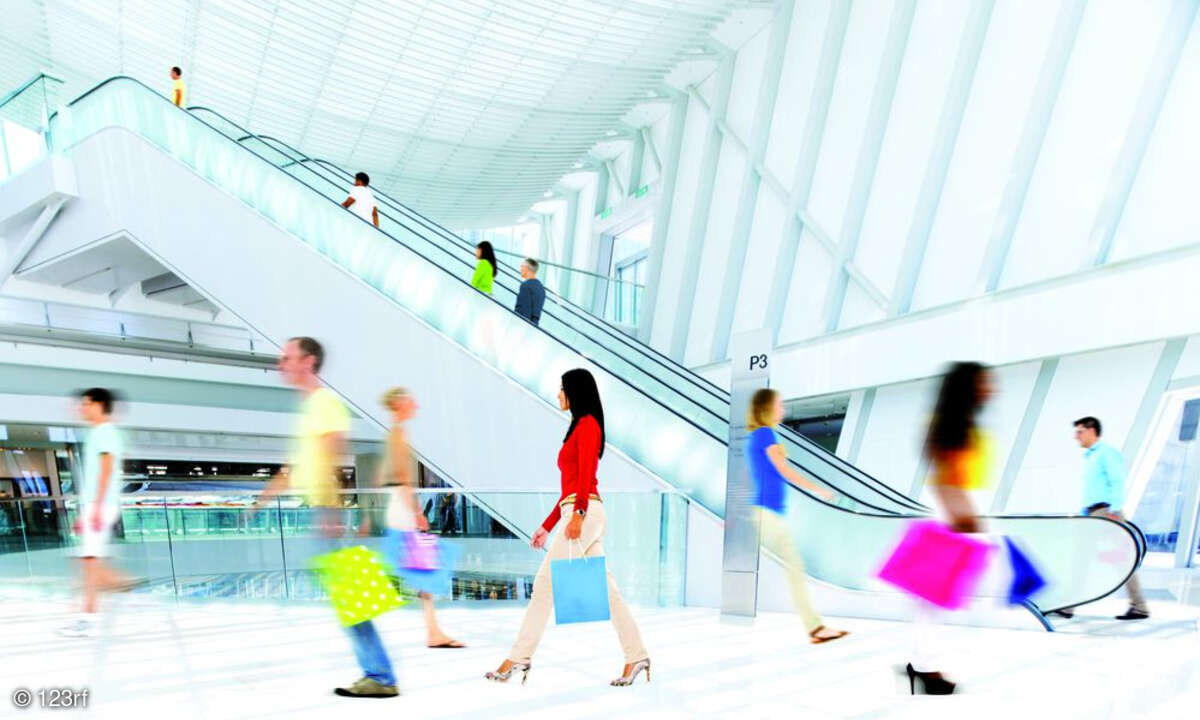 Shoppingcenter Shopping Shoppen Mall mit Menschen