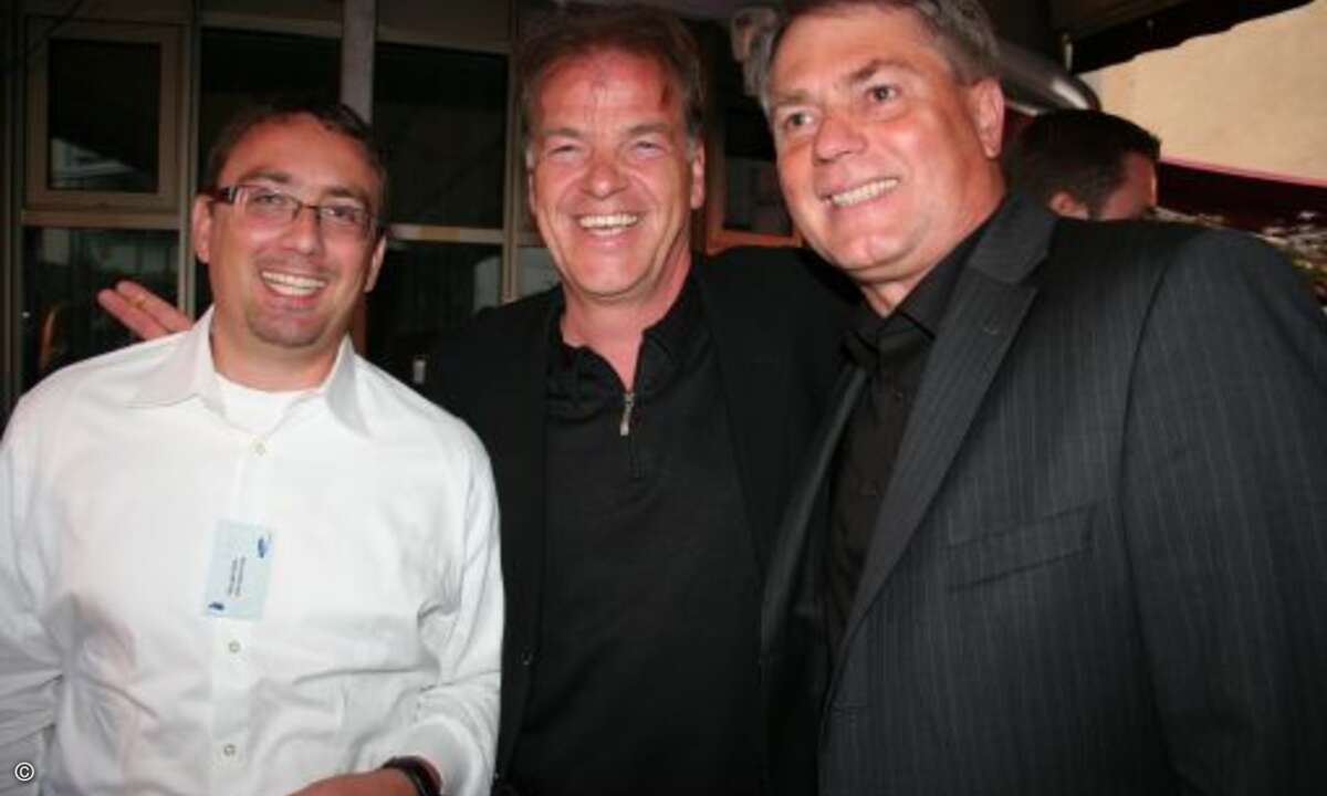 Michael Roth und Thomas Brüel von B&W Kopiertechnik mit Norbert Höpfner von Samsung