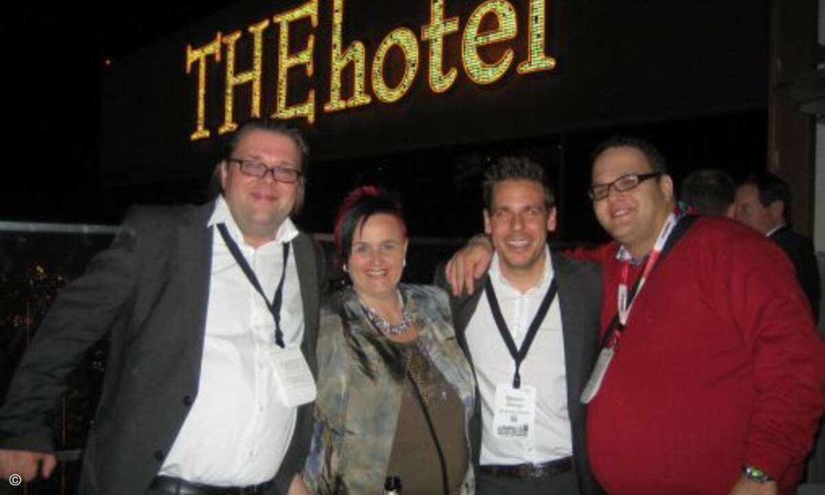 Party mit Aussicht: Dirk Walla (itk group), Marianne Nickenig (Scansource), Björn Stange (itk group) und Alexander Baudson (Scansource)