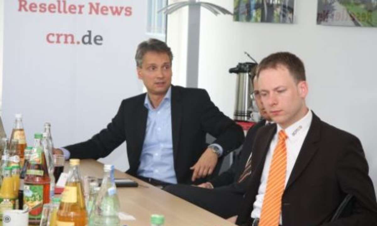 Tech Datas Geschäftsführer Vertrieb Marc Müller, Marc Adelberg (CRN) und Acmeo-Chef Henning Meyer