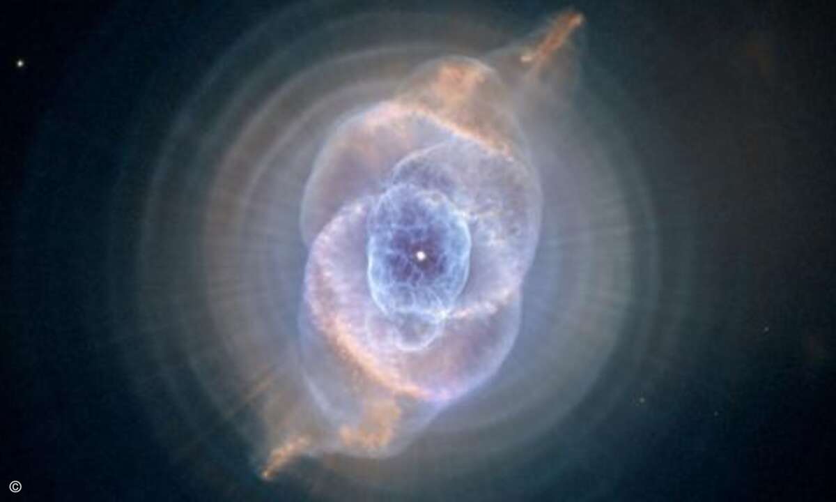 Der Katzenaugennebel in der Draco-Konstellation ist 3.000 Lichtjahre entfernt. Der Katzenaugennebel war einer der ersten planetarischen Nebel, die entdeckt wurden, gehört aber gleichzeitig zu den komplexesten bis dato (Foto: NASA, ESA, HEIC, and the