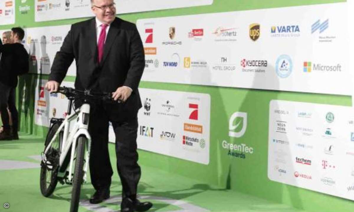 Ist Minister Altmaier etwa mit dem Fahrrad angereist? (Foto: Kyocera)