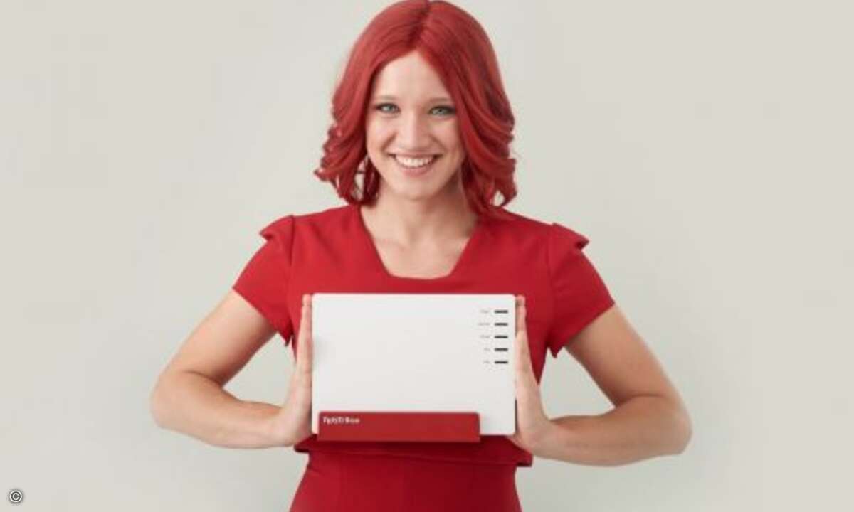 Miss IFA freut sich über intelligentes Wlan bei der »FRITZ!Box 7580« von Avm (Bild: Messe Berlin)