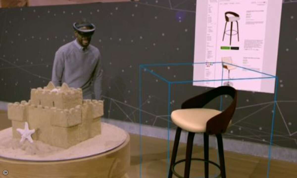 Mit der HoloLens können entsprechende Bilder, wie beispielsweise Möbelstücke, dann wieder an anderer Stelle in die Realität einbinden (Foto: Screenshot Livestream Microsoft)