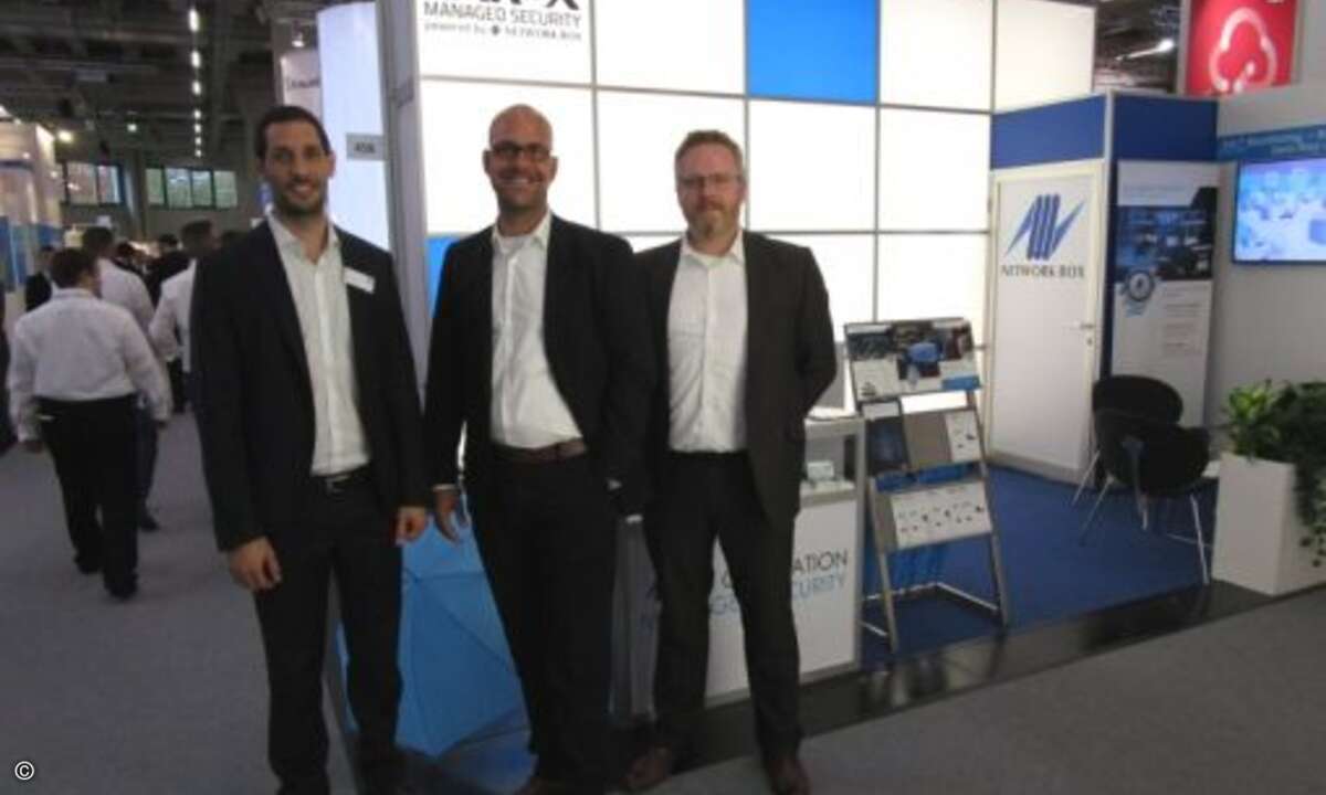 Dariush Ansari und Network Box waren gemeinsam mit Tarox am Start, hier vertreten durch Patrick Andreas und Roland Will (v.li.) (Foto: CRN)