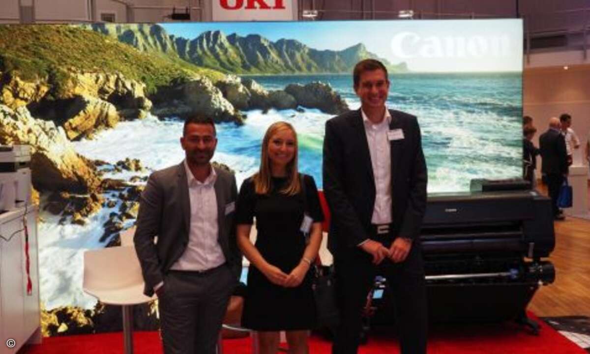 Malina Colombo mit Metin Saykin und Felix Wohlfart (beide Canon) (Foto: CRN)