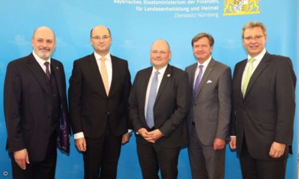 Peter Batt (IT-Leiter im Bundesinnenministerium), Albert Füracker (Staatssekretär im Bayerischen Staatsministerium der Finanzen, für Landesentwicklung und Heimat), Arne Schönbohm (Präsident des BSI), Winfried Holz (Geschäftsführer von Atos Deutschlan