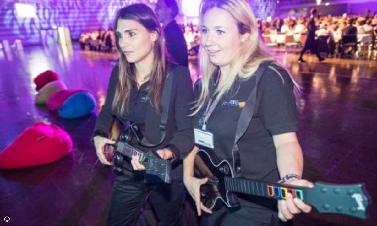 Wer mochte, konnte sich bei Guitar Hero messen… (Foto: NürnbergMesse / Thomas Geiger)