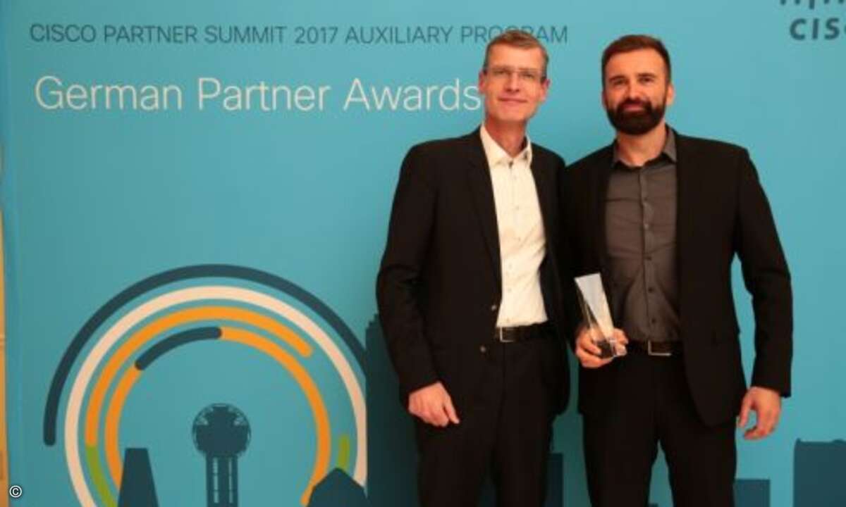 Maik Höhne (re.) nahm für NetApp die Auszeichnung als »ISV Partner of the Year« entgegen, links: Kay Wintrich von Cisco (Foto: Cisco)