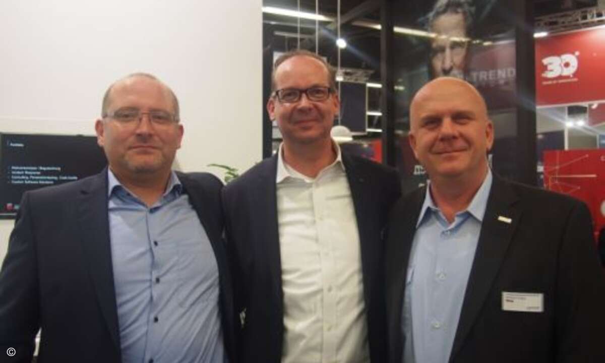 Christian Lueg und Christoph Rösseler von G Data mit Ecktart Traber von Lancom (Foto: CRN)