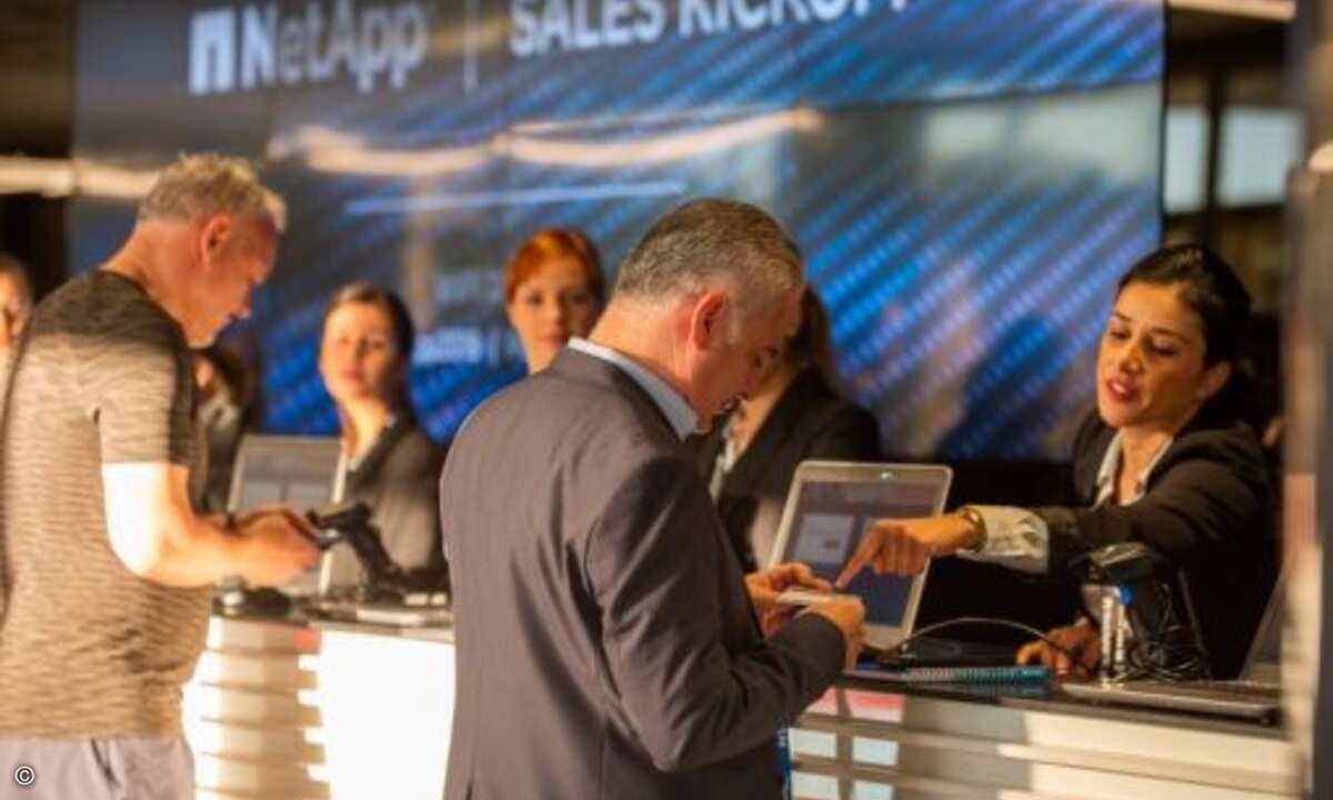 Freundlicher Empfang der Teilnehmer (Foto: Graham Lee Photography / NetApp)