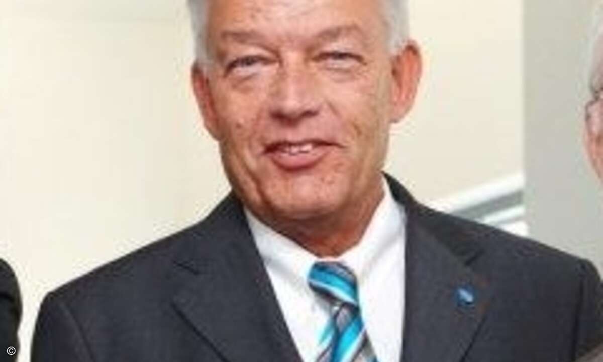 Günther Schnitzler, President bei Konica Minolta Deutschland.