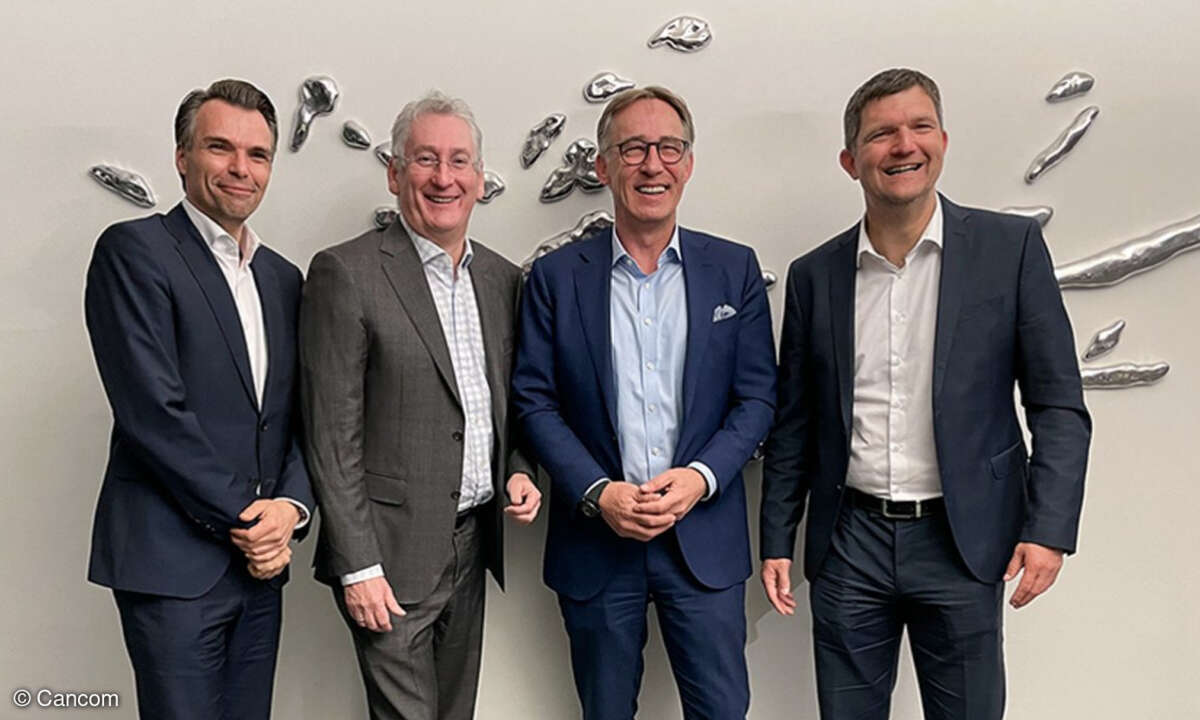 Jochen Borenich und Dr. Franz Semmernegg, beide K-Businesscom, Rüdiger Rath und Thomas Stark, beide Cancom (von links)