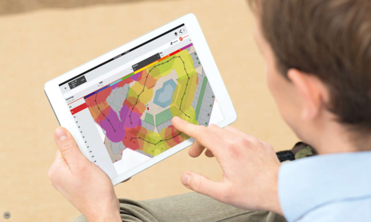 Person Holding Digital Tablet