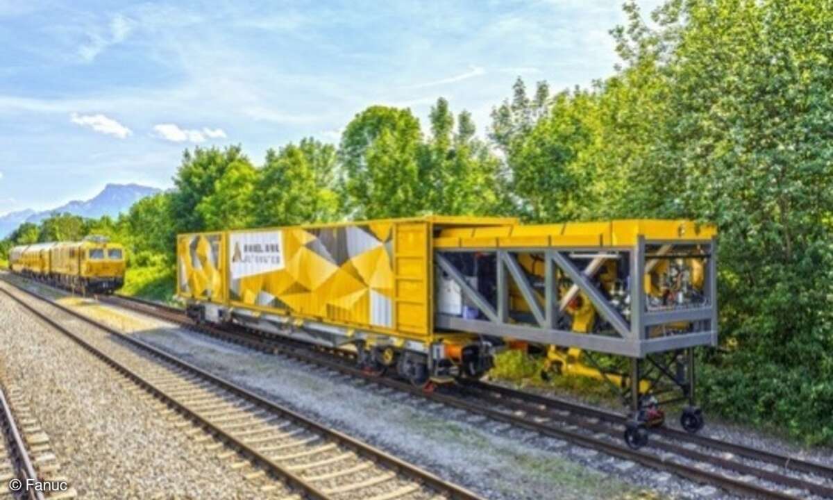 Roboter reparieren Schienen.